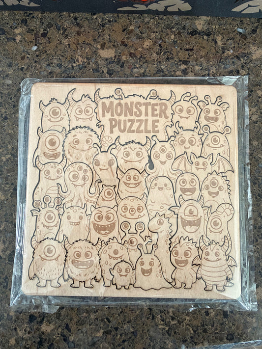 Laser cut maple Monster Puzzle with character-shaped pieces