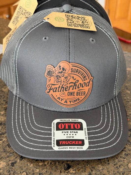 Grey trucker hat with leather Fatherhood beer patch