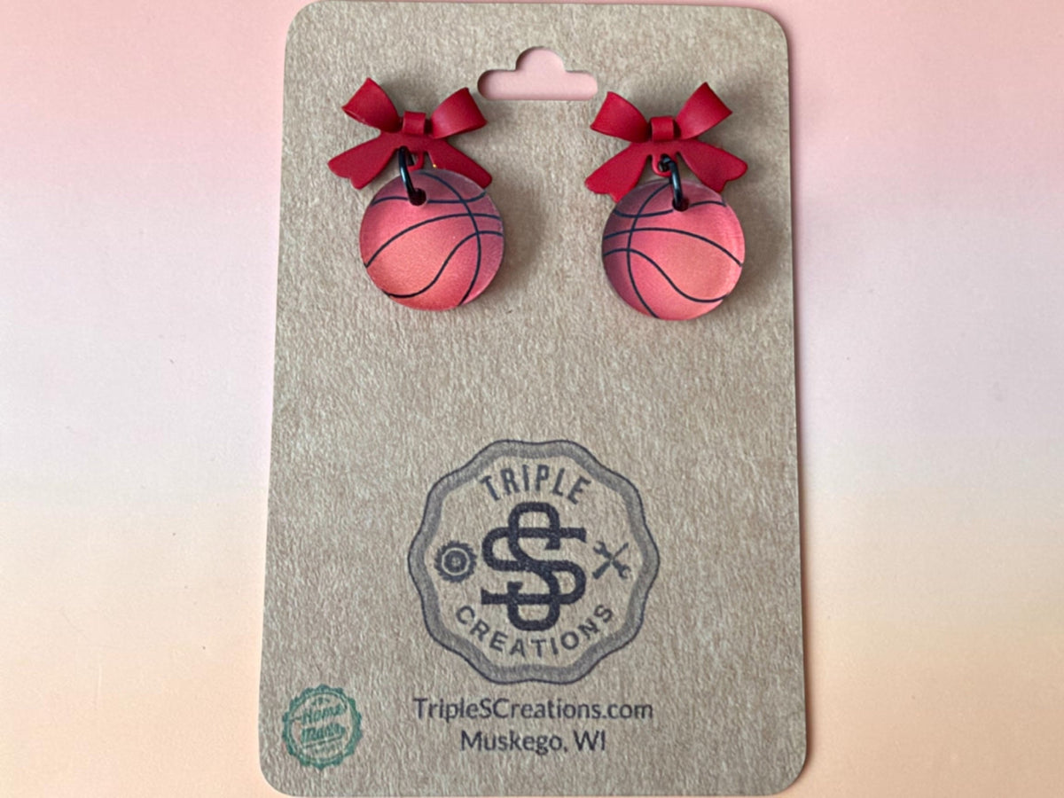 Red bow basketball earrings on a Triple S Creations card