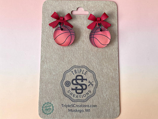 Red bow basketball earrings on a Triple S Creations card