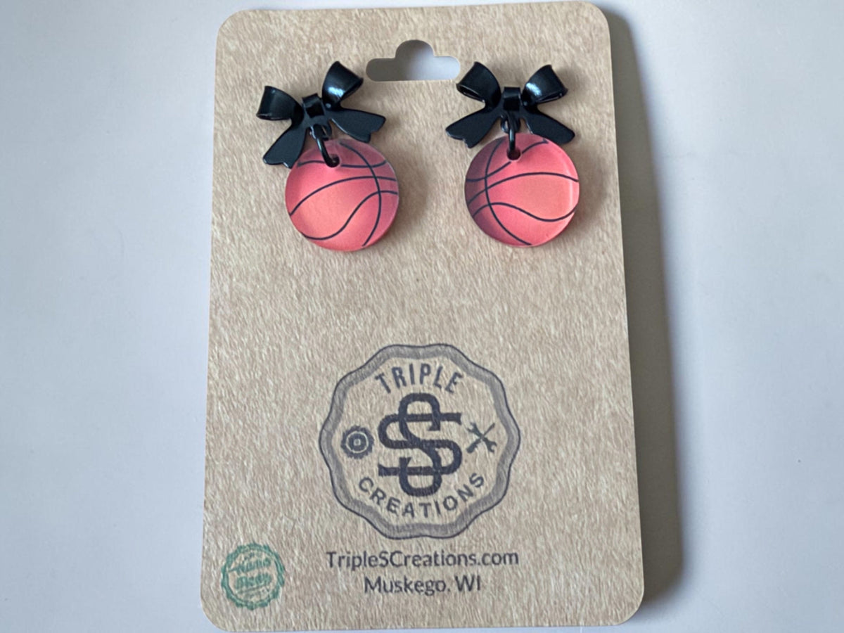 Black bow basketball earrings on a Triple S Creations card