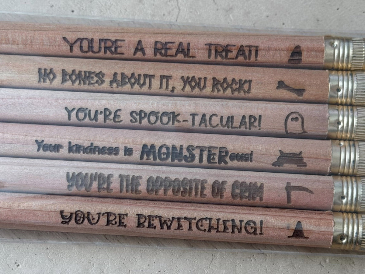 Halloween affirmation pencils laser engraved with You're a Real Treat and other sayings